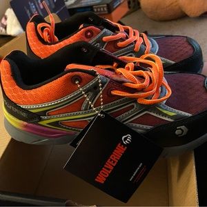 Size 5.5 Wolverine steel toe sneakers never worn but need a good home. I